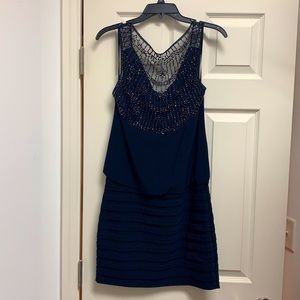 Short evening dress, scoop back